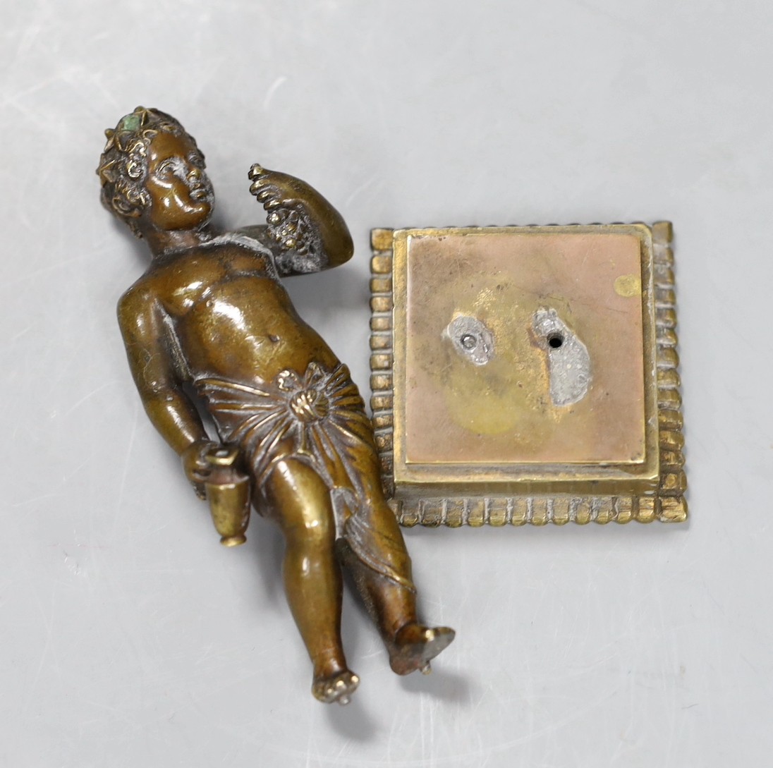A 19th century Grand Tour souvenir bronze figure a Bacchanlian putti, 9cms high